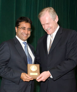 Bryce Taylor (right) presents the Lister Prize toShaf Keshavjee